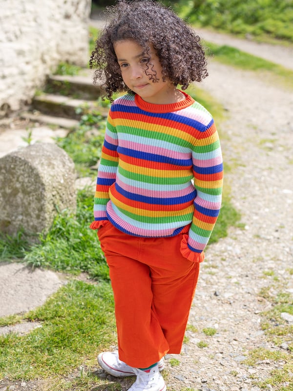 Organic cotton knitted rib jumper with lettuce finish at the sleeve. GOTS Organic Certified by Soil Association Certification Licence Number DK22283. Part of the Frugi circular Recycle Me! Range, this garment can be recycled once it comes to the end of it's usable life.