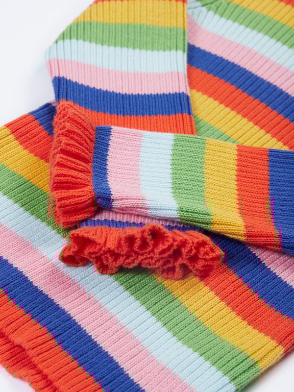 Organic cotton knitted rib jumper with lettuce finish at the sleeve. GOTS Organic Certified by Soil Association Certification Licence Number DK22283. Part of the Frugi circular Recycle Me! Range, this garment can be recycled once it comes to the end of it's usable life.