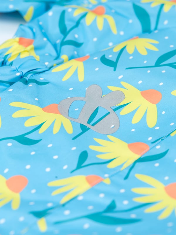 Waterproof all - one suit with fully taped seams, peaked hood, reflective print and piping and adjustable stirrups. Packs away into its own pocket. Waterproof rating 3000HH. PFC free durable water repellent finish. Recycled Polyester made from post-consumer recycled plastic