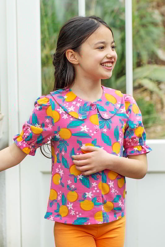 Beautiful top made with our lightweight organic cotton stretch jersey. Features oversized peter pan collar, gathered sleeve detail and button front fastening. GOTS Organic Certified by Soil Association Certification Licence Number DK22283