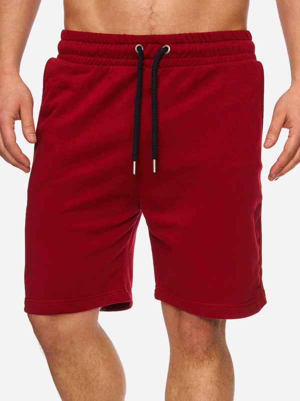 Artikelbeschreibung


	Bequeme Herren Jogging Shorts von Tazzio
	
Verschluss: Tunnelzugband
	
Hosentaschen: Eingrifftaschen, Gesäßtasche
	Basic Style
	Gerippter Bund
	Elastisches Material für eine bessere Passform
	Lockerer Tragekomfort
	Qualitativ hochwertige Verarbeitung der Materialien


Passform


	
Passform: Regular Fit
	
Länge: Kurz
	
Leibhöhe: Normal


Material &amp; Pflege


	
Material Oberstoff: 90% Baumwolle, 10% Elasthan
	
Materialkonstruktion: Sweatware
	
Elastizität: Leicht elastisch
	
Pflegehinweise: Maschinenwäsche