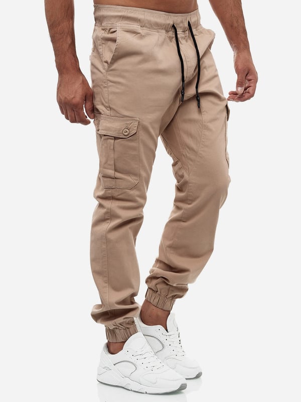 Artikelbeschreibung


	Moderne &amp; zeitlose&nbsp;Herren Jeans&nbsp;von Tazzio
	Verschluss:&nbsp;Tunnelzug
	Hosentaschen: Eingrifftaschen, Cargotaschen, Ges&auml;&szlig;taschen
	Stretchanteil f&uuml;r eine&nbsp;optimale Passform
	2 Taschen an den Beinseiten, via Knopf verschlie&szlig;bar
	Im Jogger-Stil
	Hochwertiges Material &amp; bequem zu tragen
	Ideale Hose f&uuml;r das ganze Jahr


Passform


	Passform:&nbsp;Regular Fit
	L&auml;nge: Kn&ouml;chellang
	Leibh&ouml;he: Normal


Material &amp; Pflege


	Material Oberstoff: 97% Baumwolle, 3% Elasthan
	Elastizit&auml;t: Leicht elastisch, elastischer Bund
	Pflegehinweise:&nbsp;Maschinenw&auml;sche