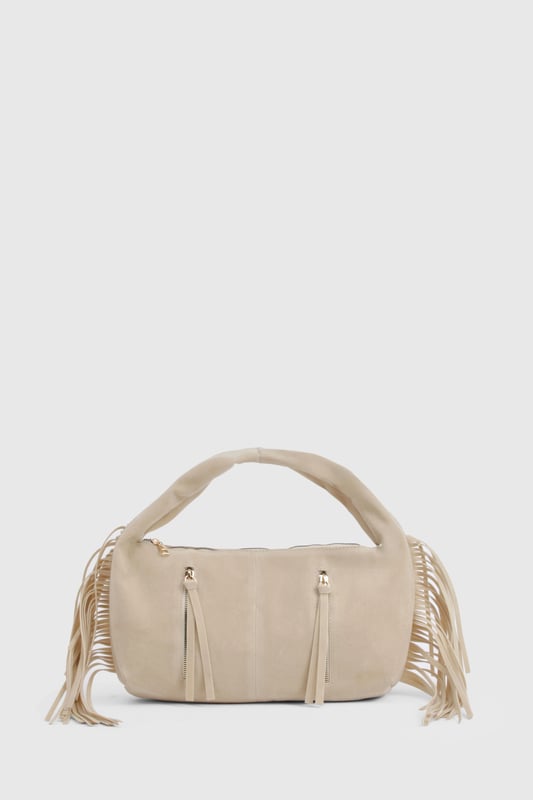 Faux suede hobo bag with statement fringe detailing along both sides
        Comfortable top handle design for easy carrying
        Practical zip closure to keep your essentials secure
        Stylish gold-tone hardware adding a touch of sophistication
        Spacious interior perfect for day-to-night essentials
    
    This boho-inspired faux suede bag brings effortless style to any outfit. The distinctive fringe detailing creates movement and texture, whilst the curved silhouette offers a relaxed yet fashionable aesthetic. Style with a fitted crop top and ribbed co-ord set for casual daytime outings, or pair with a flowing maxi dress and layered jewellery for evening drinks. The versatile design transitions seamlessly from office to dinner date, making it the perfect companion for busy days that turn into nights out. The practical size accommodates all your necessities without overwhelming your look, whilst the sturdy handle ensures comfortable carrying throughout the day. This Boohoo bag combines practicality with on-trend design for the fashion-forward woman.
