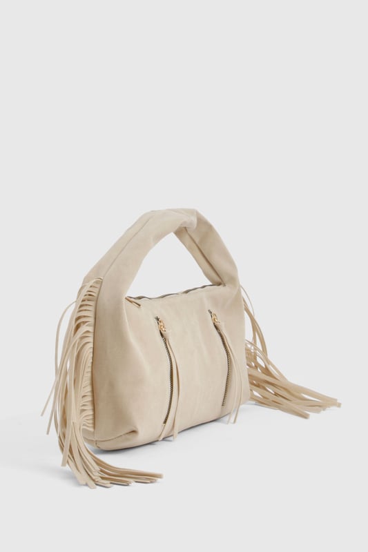 Faux suede hobo bag with statement fringe detailing along both sides
        Comfortable top handle design for easy carrying
        Practical zip closure to keep your essentials secure
        Stylish gold-tone hardware adding a touch of sophistication
        Spacious interior perfect for day-to-night essentials
    
    This boho-inspired faux suede bag brings effortless style to any outfit. The distinctive fringe detailing creates movement and texture, whilst the curved silhouette offers a relaxed yet fashionable aesthetic. Style with a fitted crop top and ribbed co-ord set for casual daytime outings, or pair with a flowing maxi dress and layered jewellery for evening drinks. The versatile design transitions seamlessly from office to dinner date, making it the perfect companion for busy days that turn into nights out. The practical size accommodates all your necessities without overwhelming your look, whilst the sturdy handle ensures comfortable carrying throughout the day. This Boohoo bag combines practicality with on-trend design for the fashion-forward woman.