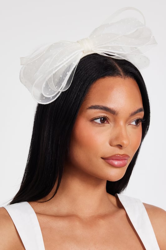 - Bow shape - Polka dot print - Headband - Excluding trims