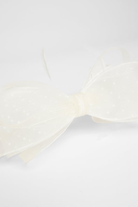 - Bow shape - Polka dot print - Headband - Excluding trims