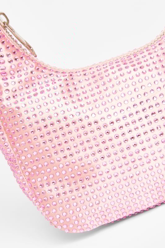 - Satin finish - Diamante embellished - Mini size - Top handle - Zip closure - Length: 20cm - Depth: 4cm - Height: 12cm approx