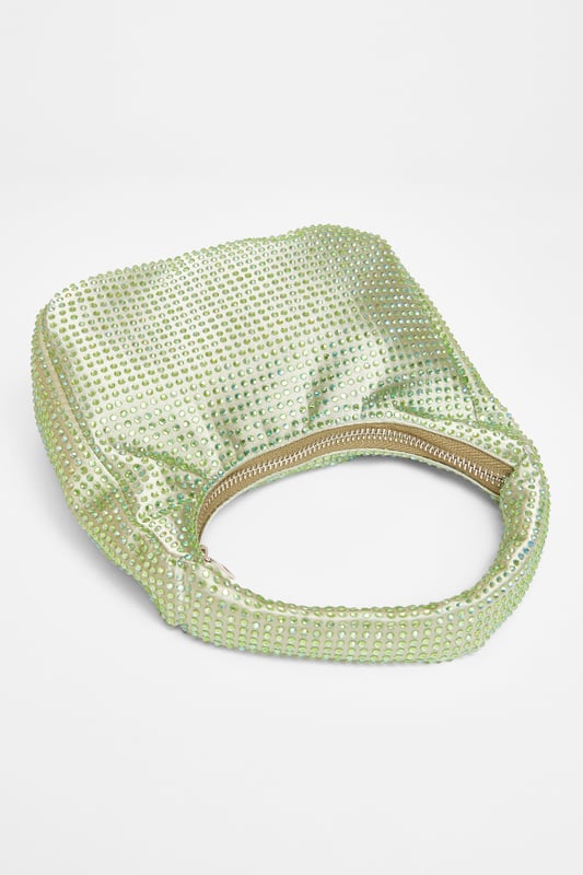 - Satin finish - Diamante embellished - Mini size - Top handle - Zip closure - Length: 20cm - Depth: 4cm - Height: 12cm approx