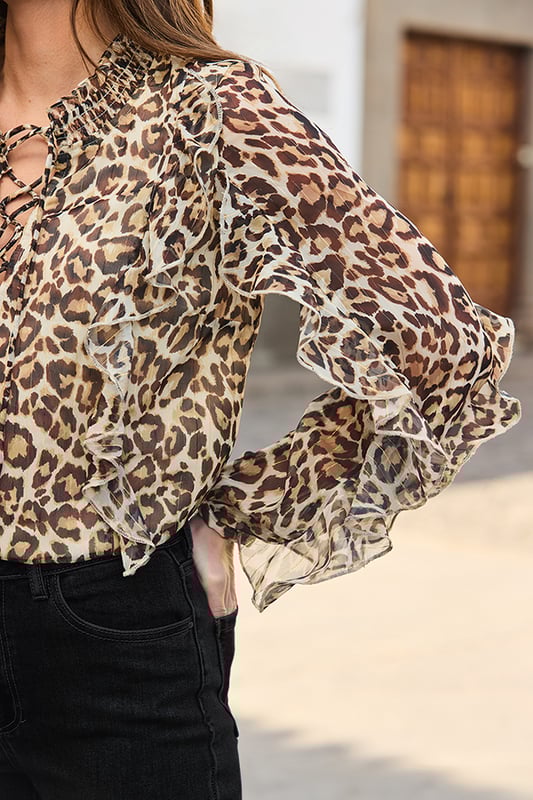 Add to basket now, thank us laterSpun from gorgeously floaty chiffon fabric Cut for a body-skimming fit, because you can have comfort and style Elevated with a sexy tie neck detailLeopard is a neutral - you'll wear it with everythingThink tailoring for the 9-5, leather trousers for date night