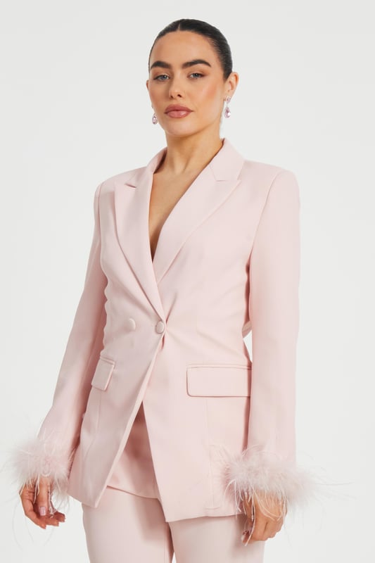 - Woven finish - Double breasted - Feather trim - Longline style - Model height: 5'2" - Model wears uk 6 / us 2 / eur 34 - Contains non-textile parts of animal origin - Always check the care wash label - Cool hand wash with mild detergent