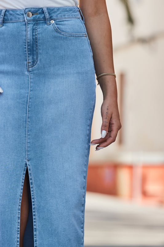 Summer's most-wanted skirt
Made from our signature soft stretch denim
Cool light blue wash
On-trend split detail midi hem
Sits high on the waist for a flattering fit
Tuck in tees, camis, cardigans and going-out tops