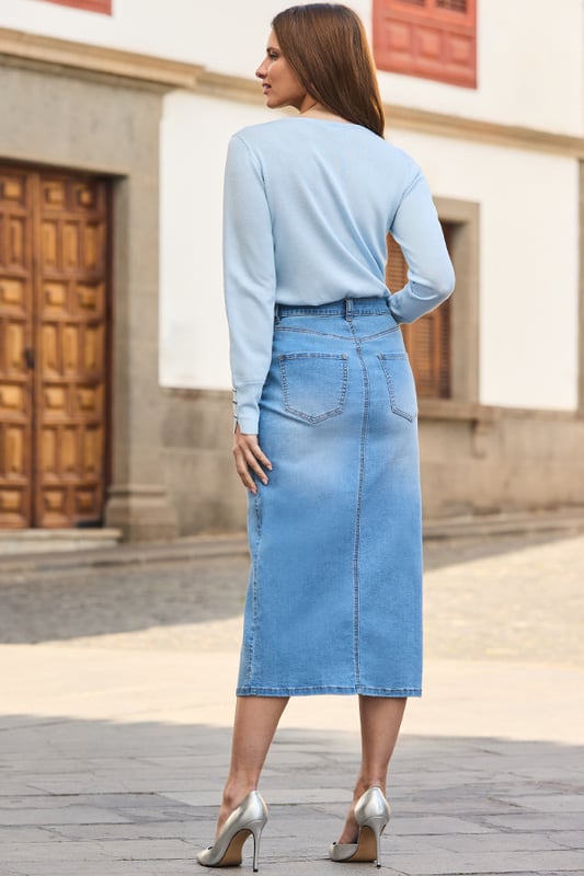 You'll wonder how you ever lived without itWe make our denim with the perfect amount of stretch Cut for a flattering column silhouette Trending longline hem Finished with a statement button-front detail Style with a nice top and knee-highs