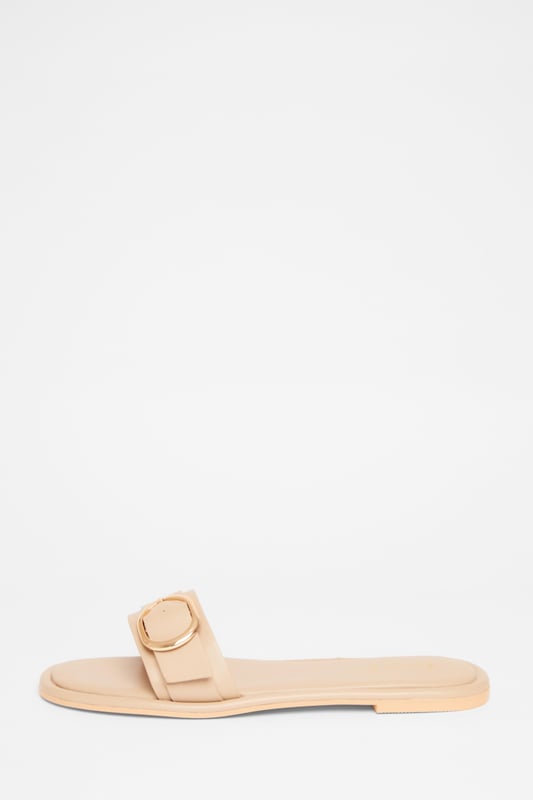 - Faux leather - Buckle detail - Flat sandals - Excluding trims