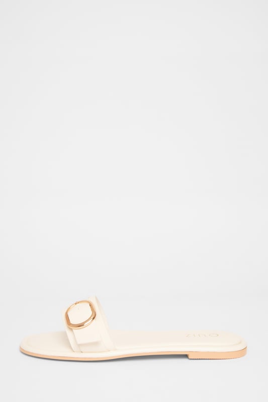 - Faux leather - Buckle detail - Flat sandals - Excluding trims