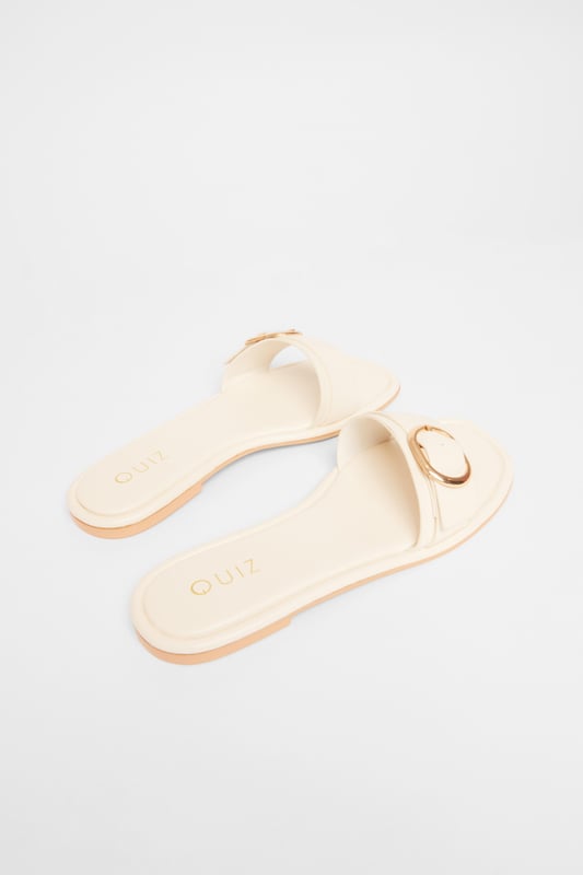 - Faux leather - Buckle detail - Flat sandals - Excluding trims