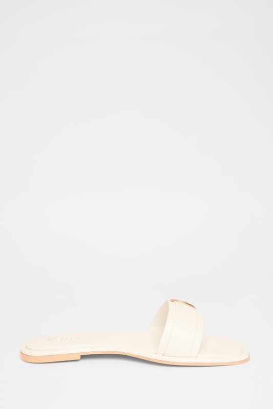 - Faux leather - Buckle detail - Flat sandals - Excluding trims