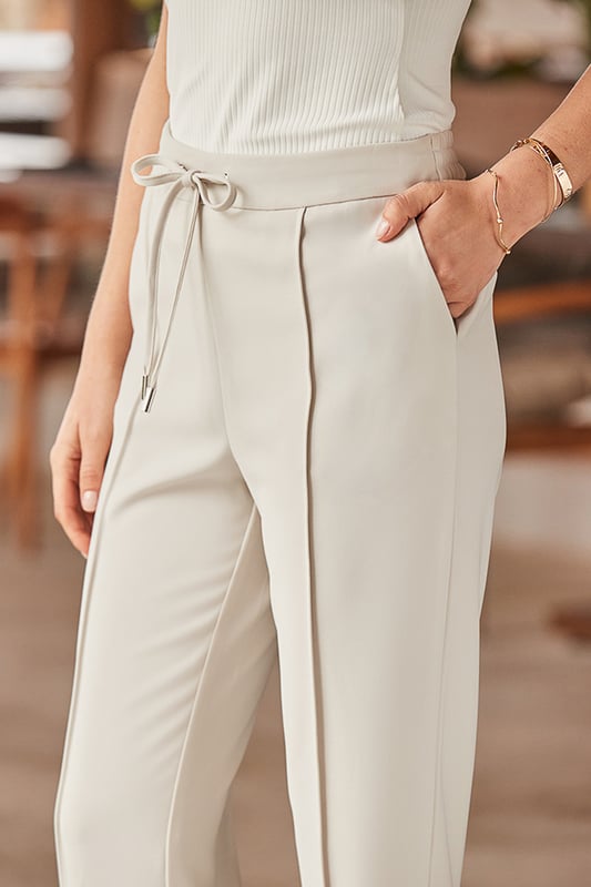 You'll wonder how you lived without them in your wardrobeDrawstring waist + relaxed fit = ridiculously comfyTapered legs for a chic silhouetteAll-important pocketsElevate them with courts and a blouse for the officeThink tees and trainers on weekendsInside leg to fit: Short 29" | Regular 31" | Long 33"
