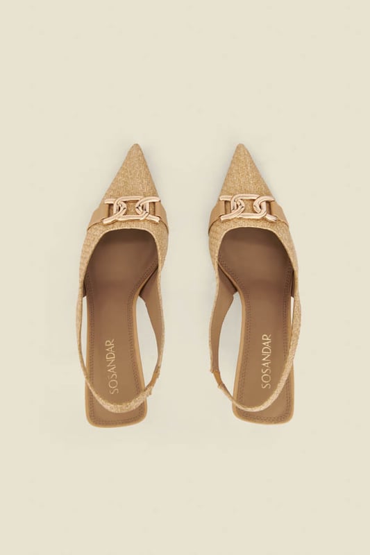 Summer's chicest shoes Crafted from summer-ready raffia Effortlessly elegant pointed toe slingback silhouette Set on a statement (but so wearable) low gold heel Elevated with a luxe gold snaffle detail Style with everything from white jeans to summer occasion dresses