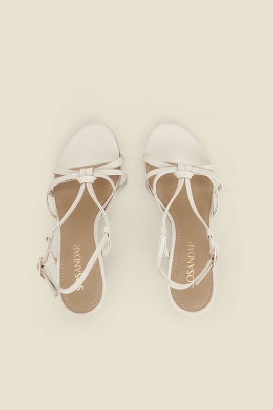 Elevating every summer outfit Chic neutral straps you'll wear with everythingSet on a wear-all-day raffia wedge Adjustable ankle strap for the perfect fit For sightseeing, sundowners and summer occasions Style with everything from swimsuits to summer dresses