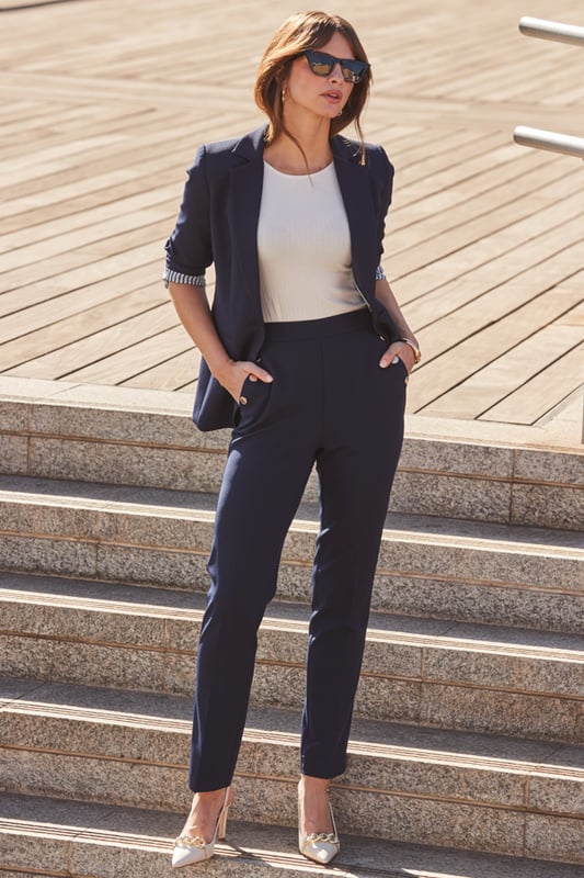 The secret to an effortlessly chic outfitCut in a timeless tapered silhouetteElevated with luxe gold buttonsNavy always looks stylishStyle with chic knits, silky blouses, simple tees and dressy topsCreate a sleek suit with the matching blazerInside leg to fit: Short 29" | Regular 31" | Long 33"