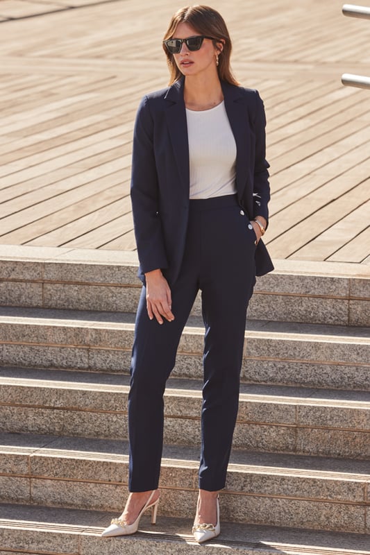 The secret to an effortlessly chic outfitCut in a timeless tapered silhouetteElevated with luxe gold buttonsNavy always looks stylishStyle with chic knits, silky blouses, simple tees and dressy topsCreate a sleek suit with the matching blazerInside leg to fit: Short 29" | Regular 31" | Long 33"