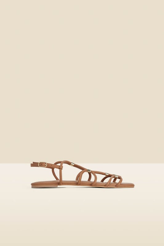 Found: the perfect summer sandal
Chic strappy style
Luxe gold details you can adjust for the perfect fit
Timeless tan goes with everything
Elevate denim shorts and a vest top
Slip on with summer dresses