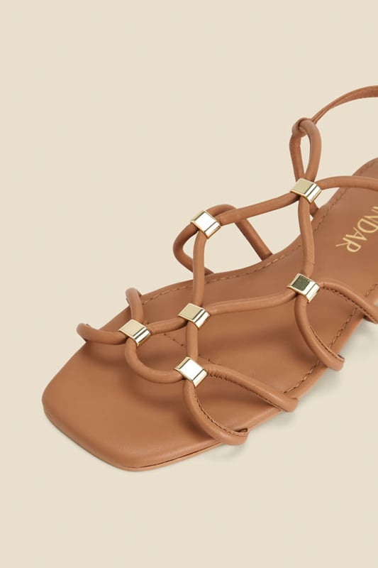 Found: the perfect summer sandal
Chic strappy style
Luxe gold details you can adjust for the perfect fit
Timeless tan goes with everything
Elevate denim shorts and a vest top
Slip on with summer dresses