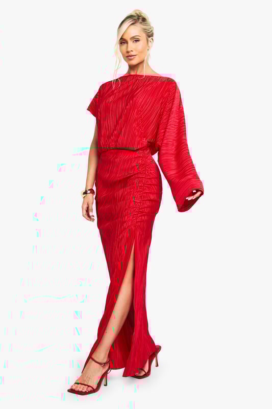 Striking plisse textured maxi dress with dramatic side slit for movement
        Asymmetric sleeve design featuring one full-length and one short sleeve
        Flattering gathered waist detail that creates a blouson effect
        Elegant slash neckline that frames the dcolletage
        Floor-sweeping length with a figure-enhancing silhouette
    
    Make a statement entrance in this show-stopping plisse maxi dress from Boohoo. The distinctive asymmetric sleeve design creates a contemporary silhouette that demands attention, whilst the gathered waist detail cinches you in at just the right spot. The daring side slit adds a touch of allure and ensures ease of movement as you dance the night away. Style with strappy heels as shown and statement gold jewellery for maximum impact. Perfect for cocktail parties, evening soires or that special night out with the girls. The textured plisse fabric catches the light beautifully as you move, ensuring all eyes are on you. This versatile piece works brilliantly for those occasions when you want to combine comfort with head-turning style.