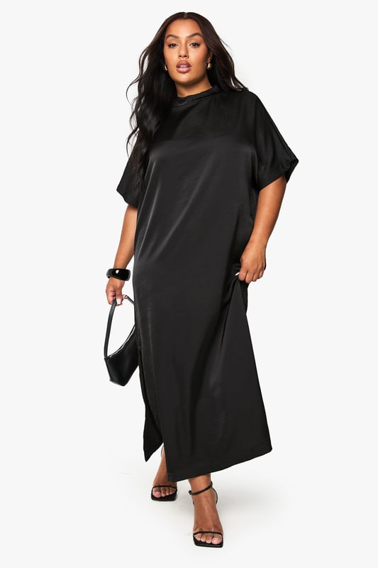 Luxurious satin finish that catches the light beautifully as you move
        Relaxed t-shirt style with short sleeves for effortless comfort
        Elegant midaxi length offering sophisticated coverage
        Clean, minimalist design perfect for accessorising to your taste
        Versatile silhouette that flatters curves with a gentle drape
    
    This satin midaxi t-shirt dress combines understated elegance with contemporary comfort. The relaxed fit skims your curves whilst the lustrous fabric adds a touch of glamour to your evening repertoire. Style with strappy heels and a compact handbag as seen on our model for a night out in the city. The simple design makes it ideal for showcasing statement jewellery - think bold earrings or layered necklaces to transform your look. For cooler evenings, throw on a cropped jacket or an oversized blazer. This dress transitions seamlessly from drinks with the girls to dancing the night away, offering both comfort and style that doesn't compromise on sophistication. The midaxi length strikes the perfect balance between allure and elegance, making this a true wardrobe hero for your going-out collection.