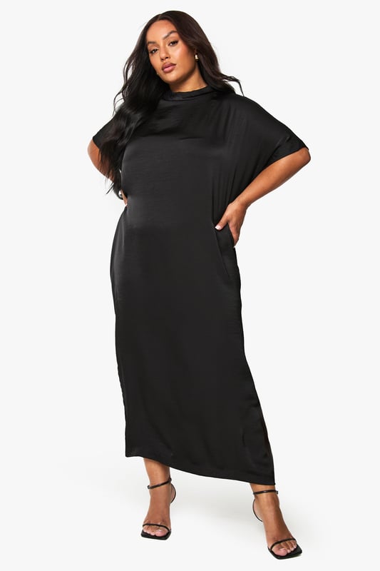 Luxurious satin finish that catches the light beautifully as you move
        Relaxed t-shirt style with short sleeves for effortless comfort
        Elegant midaxi length offering sophisticated coverage
        Clean, minimalist design perfect for accessorising to your taste
        Versatile silhouette that flatters curves with a gentle drape
    
    This satin midaxi t-shirt dress combines understated elegance with contemporary comfort. The relaxed fit skims your curves whilst the lustrous fabric adds a touch of glamour to your evening repertoire. Style with strappy heels and a compact handbag as seen on our model for a night out in the city. The simple design makes it ideal for showcasing statement jewellery - think bold earrings or layered necklaces to transform your look. For cooler evenings, throw on a cropped jacket or an oversized blazer. This dress transitions seamlessly from drinks with the girls to dancing the night away, offering both comfort and style that doesn't compromise on sophistication. The midaxi length strikes the perfect balance between allure and elegance, making this a true wardrobe hero for your going-out collection.