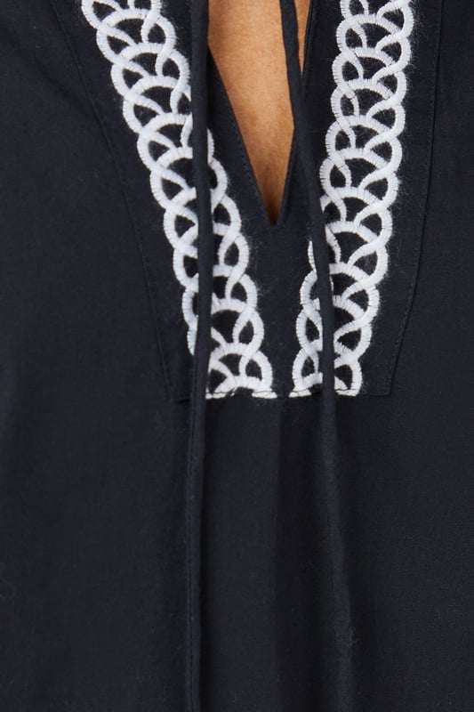 Embroidered Detail Blouse Distinctive embroidered trim along the V-neckline and hem adds artisanal character
Relaxed regular fit with voluminous balloon sleeves for contemporary silhouette
Crafted from pure cotton for breathable comfort throughout the day
Split V-neckline with subtle tie detail creates a flattering frame
Versatile woven design that transitions effortlessly from casual to smart-casual occasions
This Principles embroidered detail blouse combines timeless design with modern styling. The striking geometric embroidery creates a beautiful contrast against the woven fabric, whilst the relaxed silhouette ensures all-day comfort without compromising on style. Pair with wide-leg denim and flat sandals as seen on our model for a relaxed weekend look, perfect for farmers' markets or casual brunches. For a more polished daytime ensemble, try tucking the front into tailored trousers and adding a structured tote. The balloon sleeves add a touch of drama to this otherwise understated piece, making it ideal for family gatherings or informal work settings. This versatile blouse works beautifully with both light and dark bottoms, offering countless styling possibilities throughout the seasons.