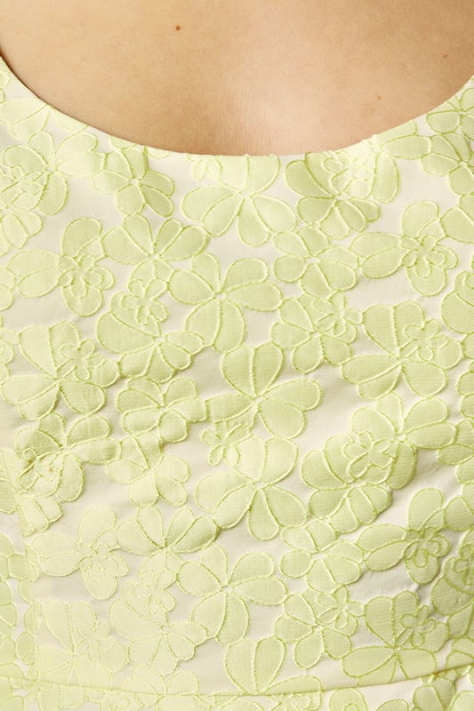 Elegant sleeveless design with sophisticated jacquard texture
        Flattering peplum silhouette that accentuates the waistline
        Refined square neckline for a contemporary touch
        Structured bodice with subtle shaping for a polished look
        Fully lined for comfort and a smooth finish
    
    This exquisite jacquard peplum top from Coast embodies refined elegance for your special occasions. The structured bodice with its contemporary square neckline creates a flattering frame for your dcolletage, whilst the peplum detail gracefully highlights the waist for a feminine silhouette. As shown, pair with coordinating trousers for a sophisticated co-ord ensemble perfect for summer weddings or race day events. Alternatively, style with a tailored pencil skirt and strappy heels for evening soires. Complete your look with delicate jewellery and a clutch bag for occasions where making an impression matters. The versatile design transitions beautifully from formal daytime events to elegant evening gatherings, making it a valuable addition to your occasion wardrobe.