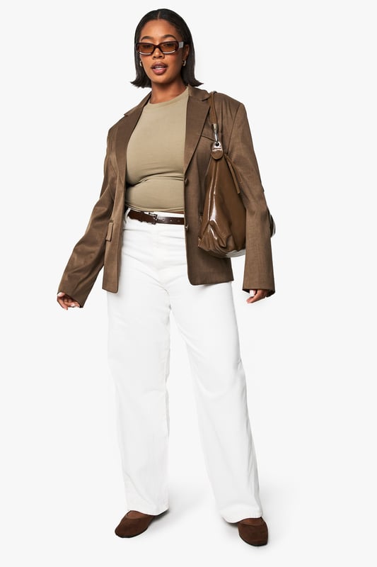 PLUS BOOHOO BASICS FITTED TOP Crafted from soft cotton fabric for all-day comfort
Classic crew neckline offers versatile styling options
Short sleeve design perfect for layering or wearing alone
Figure-hugging silhouette creates a flattering shape
Part of the Boohoo Basics collection for everyday wear
This essential Boohoo Basics top forms the foundation of countless outfits in your wardrobe rotation. The fitted design pairs beautifully with high-waisted trousers as shown, creating a balanced silhouette that works for various body types. Layer under a structured jacket for an effortlessly chic daytime look, or style with your favourite denim and trainers for casual weekend brunches. The versatile nature of this piece makes it ideal for transitioning from running errands to impromptu coffee dates. For a more polished appearance, tuck into a midi skirt and add a belt to define your waist. This wardrobe staple adapts to your lifestyle, offering comfort without compromising on style - the hallmark of truly functional fashion.