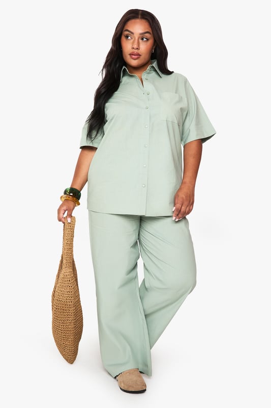 Cotton fabric provides breathable comfort for all-day wear
        Wide leg design offers a relaxed, flowing silhouette
        Elasticated waistband ensures a comfortable, adjustable fit
        Plus size tailoring designed specifically for curvier figures
        Versatile trousers that transition effortlessly from day to evening
    
    These wide leg cotton trousers from Boohoo deliver both comfort and contemporary style for the fashion-forward woman. The relaxed silhouette creates a flattering drape that moves beautifully with every step, whilst the soft cotton fabric ensures breathability throughout the day. Style them as shown with a matching button-up shirt for a coordinated set that projects confidence and sophistication. For casual outings, pair with trainers and a cropped tee, or dress them up for family gatherings with a fitted blouse and statement jewellery. The versatile design works brilliantly with both fitted and oversized tops, making these trousers a wardrobe essential that can be styled countless ways. Perfect for those seeking comfort without compromising on style.