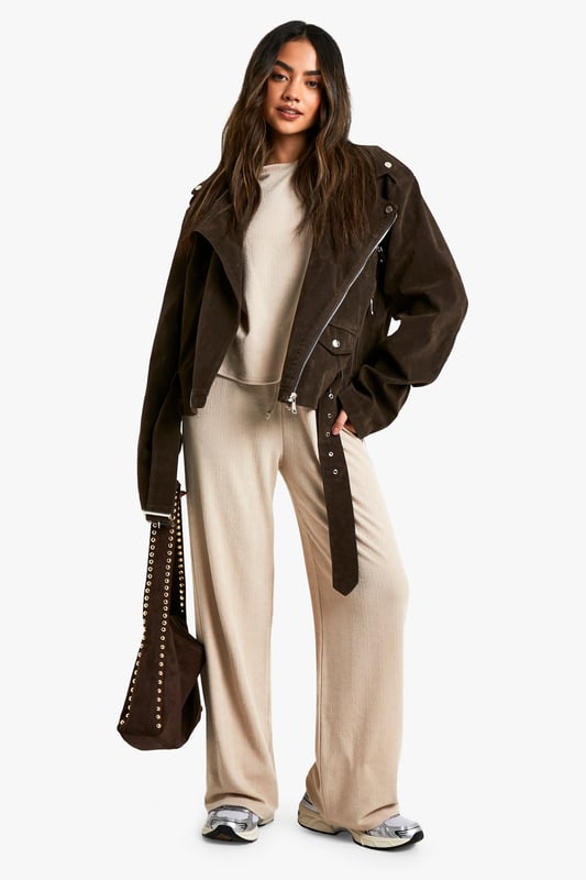 Oversized T-shirt with relaxed fit and dropped shoulders
        Wide-leg trousers with comfortable, flowy silhouette
        Coordinated set for effortless style
        Drawstring waist on trousers for adjustable fit
        Versatile neutral tone suitable for various occasions
    
    Embrace laid-back chic with this effortlessly cool oversized T-shirt and wide-leg trouser co-ord from Boohoo. The relaxed fit of the top, featuring dropped shoulders, pairs perfectly with the flowy silhouette of the trousers, creating a harmonious ensemble that's both comfortable and on-trend. Ideal for casual outings or lounging at home, this set can be easily dressed up or down. Style it with trainers and a leather jacket for a street-smart look, or pair with statement jewellery and heeled sandals for a more polished appearance. The drawstring waist on the trousers allows for a customised fit, while the neutral tone of the set offers endless styling possibilities. Whether you're meeting friends for brunch or running errands, this co-ord set promises to keep you looking effortlessly stylish without compromising on comfort.