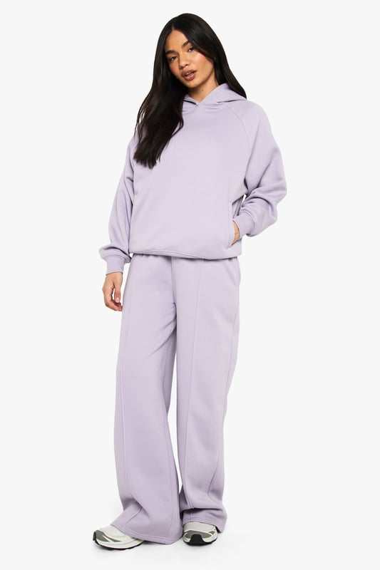 Straight leg joggers featuring distinctive pintuck detailing for a structured silhouette
        Soft fleece-back fabric offers comfort without compromising on style
        High-rise waistband provides a flattering fit and excellent support
        Relaxed straight leg cut allows for effortless movement throughout the day
        Versatile design perfect for creating both casual and athleisure looks
    
    These straight leg pintuck joggers from Boohoo combine comfort with contemporary style for the fashion-forward woman. The structured pintuck detailing adds a refined touch to the classic jogger silhouette, making them suitable for more than just lounging at home. Style them with the matching hoodie as seen on our model for an on-trend coordinated look, or dress them up with a fitted bodysuit and trainers for casual outings. The straight leg cut offers a more polished alternative to traditional tapered joggers, while the soft fleece-back fabric ensures all-day comfort. Perfect for weekend brunches, running errands, or casual meet-ups with friends. Add a tote bag and minimal jewellery to complete the look. These joggers strike the ideal balance between relaxed and put-together, making them an essential addition to your casual wardrobe.
