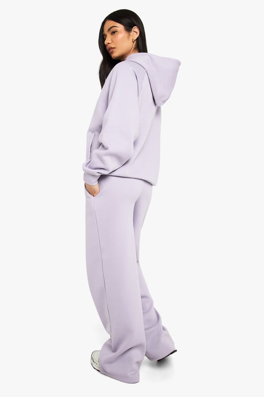 Straight leg joggers featuring distinctive pintuck detailing for a structured silhouette
        Soft fleece-back fabric offers comfort without compromising on style
        High-rise waistband provides a flattering fit and excellent support
        Relaxed straight leg cut allows for effortless movement throughout the day
        Versatile design perfect for creating both casual and athleisure looks
    
    These straight leg pintuck joggers from Boohoo combine comfort with contemporary style for the fashion-forward woman. The structured pintuck detailing adds a refined touch to the classic jogger silhouette, making them suitable for more than just lounging at home. Style them with the matching hoodie as seen on our model for an on-trend coordinated look, or dress them up with a fitted bodysuit and trainers for casual outings. The straight leg cut offers a more polished alternative to traditional tapered joggers, while the soft fleece-back fabric ensures all-day comfort. Perfect for weekend brunches, running errands, or casual meet-ups with friends. Add a tote bag and minimal jewellery to complete the look. These joggers strike the ideal balance between relaxed and put-together, making them an essential addition to your casual wardrobe.
