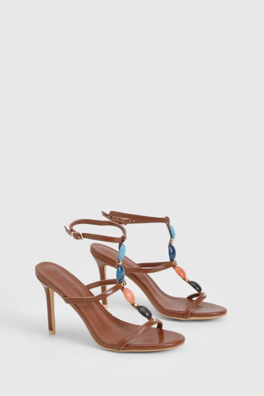 We'll make sure your shoes keep you one stylish step ahead of the crowdWhether you're keeping it simple in sliders, living the high life in heels or joining the fash pack in flatforms, you'll be heading to shoe heaven with our fashion-forward footwear collection. Boots are your day-to-night bestfriend, giving a floral dress&nbsp;that tough twist - add a biker jacket for even more attitude. Find your summer feet in jelly sandals and enjoy balmy nights in block heels.