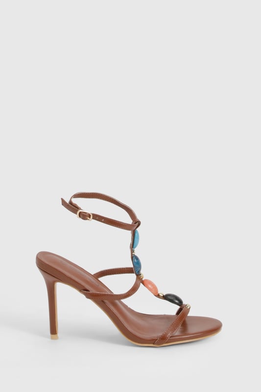 We'll make sure your shoes keep you one stylish step ahead of the crowdWhether you're keeping it simple in sliders, living the high life in heels or joining the fash pack in flatforms, you'll be heading to shoe heaven with our fashion-forward footwear collection. Boots are your day-to-night bestfriend, giving a floral dress&nbsp;that tough twist - add a biker jacket for even more attitude. Find your summer feet in jelly sandals and enjoy balmy nights in block heels.