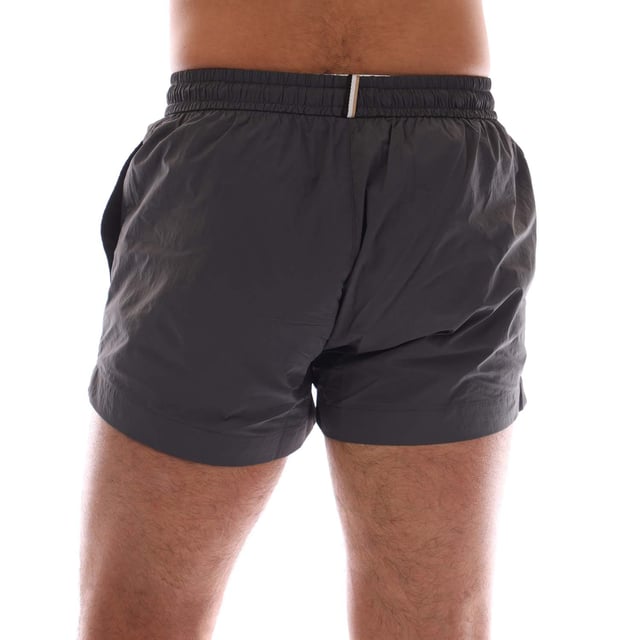 Mens Hugo Boss Mooneye Swim Shorts in charcoal.- Elastic waistband.- Side pockets.- Short length.- Plastic-tipped drawcords with further branding complete this pair.- Printed with a large BOSS logo.- 100% Polyamide.- Ref: 50469280011