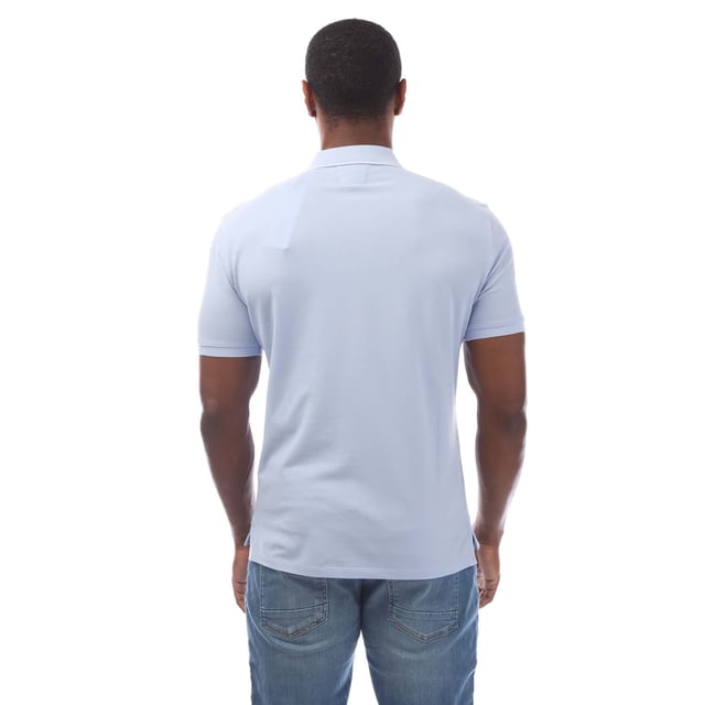 Mens C.P. Company Stretch Piquet Logo Polo Shirt in blue.- Ribbed polo collar.- Short sleeves with ribbed cuffs.- Two button fastened placket.- Logo patch at the chest.- Split hem to the sides.- Straight hem.- 95% Cotton  5% Elastane.- Ref: 18CMPL097A814