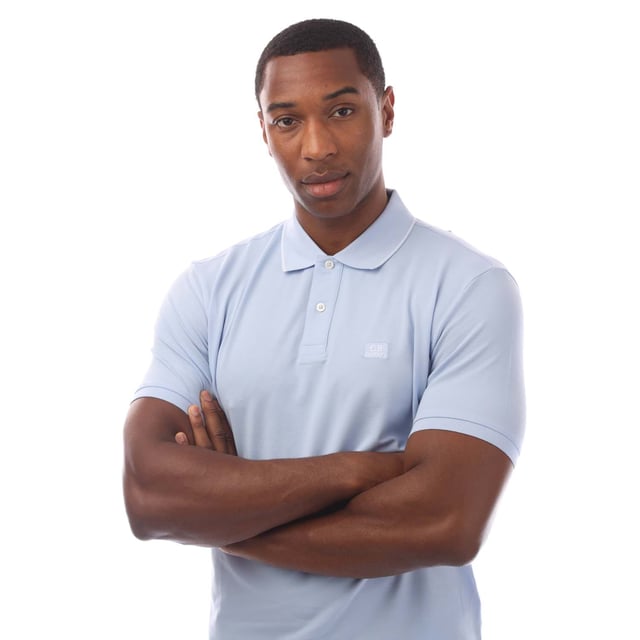 Mens C.P. Company Stretch Piquet Logo Polo Shirt in blue.- Ribbed polo collar.- Short sleeves with ribbed cuffs.- Two button fastened placket.- Logo patch at the chest.- Split hem to the sides.- Straight hem.- 95% Cotton  5% Elastane.- Ref: 18CMPL097A814