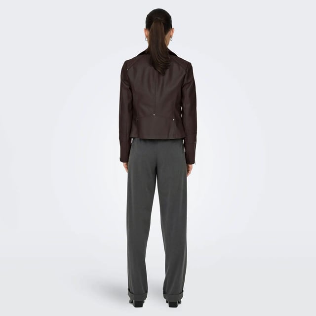 Womens Only Gemma Faux Leather Biker Jacket in chocolate torte- Classic collar with notch lapel.- Asymmetric zip fastening.- Snap fastening at lapels.- Stitch detail at shoulders and sleeves.- Zipped cuffs.- Zipped front pockets.- Mock zipped chest pockets.- Fully lined. - Measurement from shoulder to hem: 20in approximately. - Shell: 75% Viscose  25% Polyester.  Coating: Polyurethane.  Lining: 100% Polyester. Machine washable. - Ref: 15153079Measurements are intended for guidance only.
