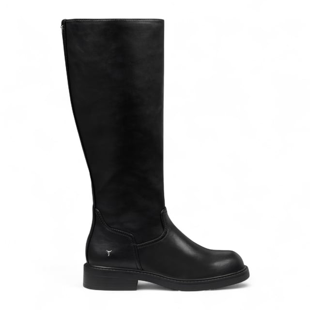 The Windsor Smith Blessing boots combine sleek design with practical features. Crafted with a non-leather upper and lining, these knee-high boots offer durability and style. The round toe shape and non-slip TPR sole ensure comfort and safety, while the full-length inside zipper with a bull logo puller provides easy access and a signature detail. With a modest 35 mm heel height, these boots are perfect for everyday wear with a bold edge.

Upper: Fuax Leather
Lining: Synthetic
Sole: Durable Non-Slip TPR
Heel Height: 35 mm (3.5 cm)
Closure: Full-length inside zipper with bull logo puller
Toe: Round
Shaft Height: Knee-High
