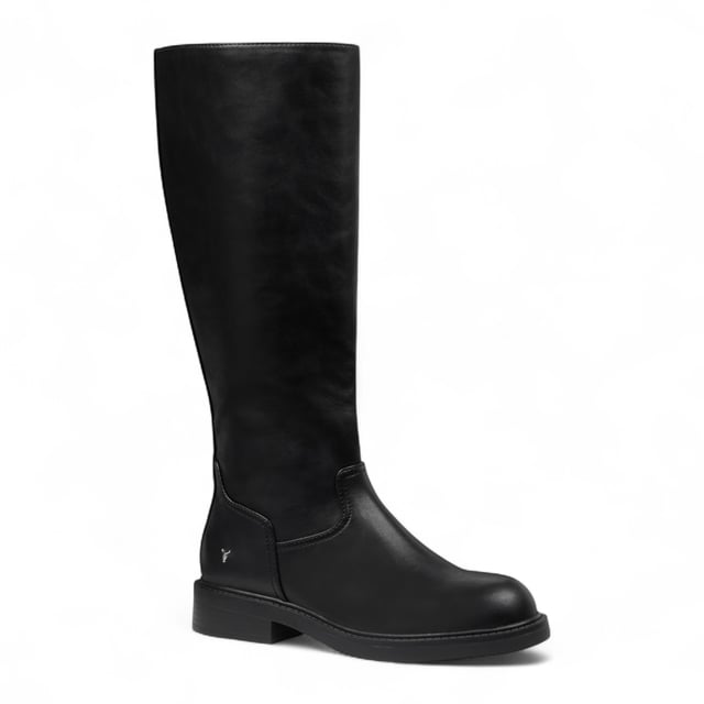 The Windsor Smith Blessing boots combine sleek design with practical features. Crafted with a non-leather upper and lining, these knee-high boots offer durability and style. The round toe shape and non-slip TPR sole ensure comfort and safety, while the full-length inside zipper with a bull logo puller provides easy access and a signature detail. With a modest 35 mm heel height, these boots are perfect for everyday wear with a bold edge.

Upper: Fuax Leather
Lining: Synthetic
Sole: Durable Non-Slip TPR
Heel Height: 35 mm (3.5 cm)
Closure: Full-length inside zipper with bull logo puller
Toe: Round
Shaft Height: Knee-High