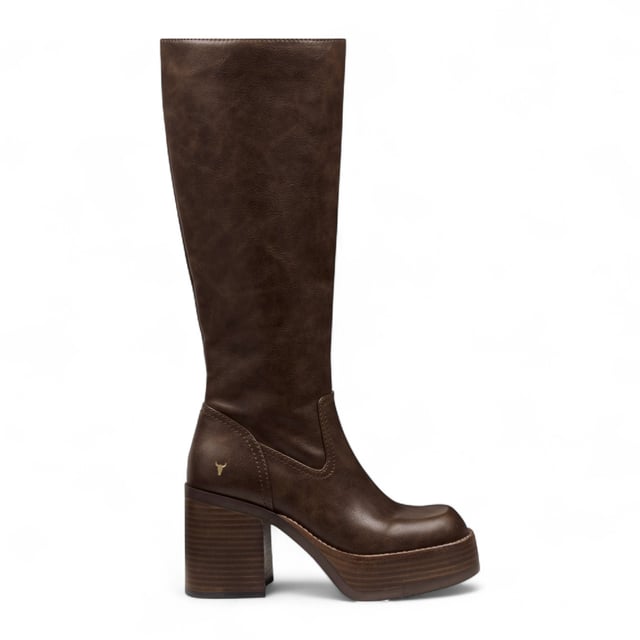 Elevate your look with the Windsor Smith Niche knee high platform boots. Designed with a sleek non-leather upper and lining, these knee-high boots combine bold style with comfort and functionality. The 90 mm block heel and 35 mm platform provide height and stability, while the soft square toe adds a modern touch. A full-length inside zipper with a signature bull zip puller makes for easy wear. Finished with a durable rubber outsole and leather-covered platform heels, these boots are perfect for statement-making style.

Upper: Faux Leather
Lining: Synthetic
Sole: Rubber
Height: Knee-High
Heel Height: 90 mm (9 cm)
Platform Height: 35 mm (3.5 cm)
Closure: Full-length inside zipper with bull puller
Toe: Soft Square
Heel Type: Block heel
Details: Leather-covered platform heels