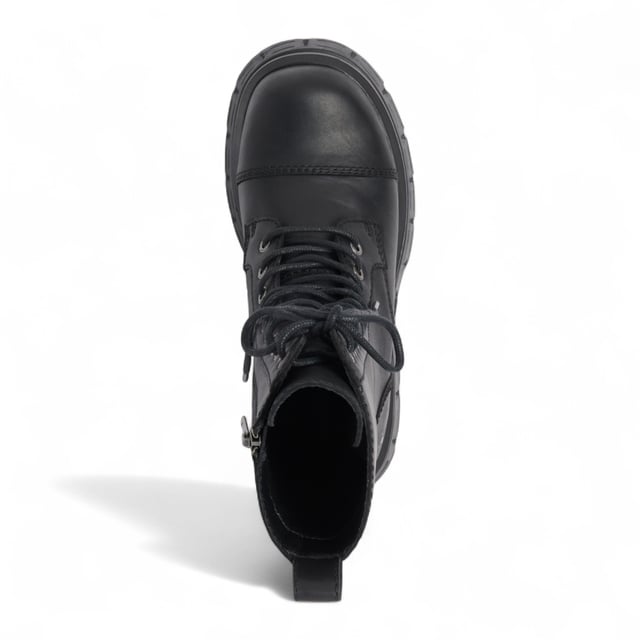 Make a fearless statement with the Windsor Smith Screaming platform boots - where combat style meets elevated edge. Crafted from cow waxy leather, these 11-eyelet lace-up boots feature a chunky cleated platform wedge sole, reinforced toe cap, and heavy cable stitch detail. The inside zip allows for easy slip-on access, while the leather pull tab and embossed bull logo at the back add signature Windsor Smith touches. Designed for attitude and comfort, they stand tall with a 7.5 cm heel and 5.6 cm platform.
Upper: Cow Waxy Leather
Lining: Non-Leather
Sole: Lightweight PU (cleated wedge)
Closure: Lace-up with inside zip
Toe: Round with toe cap
Platform Height: 5.6 cm
Heel Height: 7.5 cm
Design: Chunky combat boot with heavy stitch detail
Branding: Embossed bull logo at back
