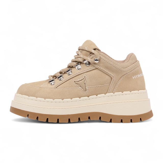 Meet the Windsor Smith Ultimatum - Women’s platform sneakers redefined with a rugged twist. Crafted with a soft sand suede upper and contrast stitching, these chunky sneakers feature a two-tone TPR platform sole that combines street style with hiking influence. Metal hook-and-eye details and bull-logo silver D-rings elevate the design, while the twin-colored laces, padded tongue, and collar offer added comfort. With a 63 mm heel and a 46 mm forepart platform, these cross-hiker sneakers deliver elevated style without compromising stability.

Upper: Sand Suede
Lining: Sports Fabric
Sole: Two-tone Chunky TPR
Closure: Twin-colored lace with metal hook & eye + D-rings
Heel Height: 63 mm
Platform Forepart Height: 46 mm
Design: Cross between hiker boot and sneaker
Details: Padded tongue and collar, contrast stitching, molded footbed