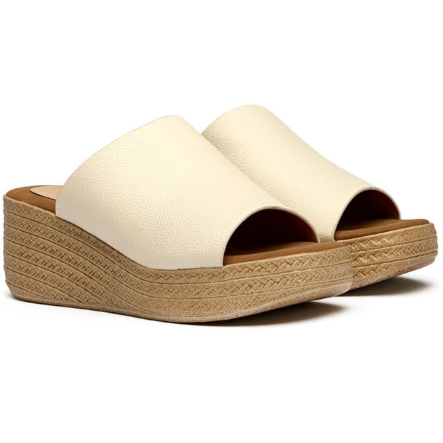 Sandalias cuña de marca Solesister para mujeres, fabricadas con sintético y una suela sintética. Presentan: punta redonda y forro y plantilla sintéticos.