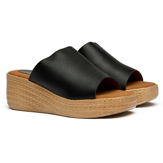 Sandalias de cuña Solesister Brandy negras para mujer, fabricadas con sintético y suela sintética. Punta redonda, forro y plantilla sintéticos.